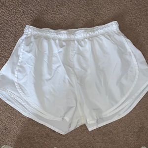 white nike running shorts